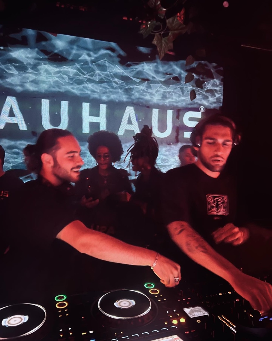 DOSO and Mehrad on the CDJs under the Bauhaus screen, opening for Coco and Breezy